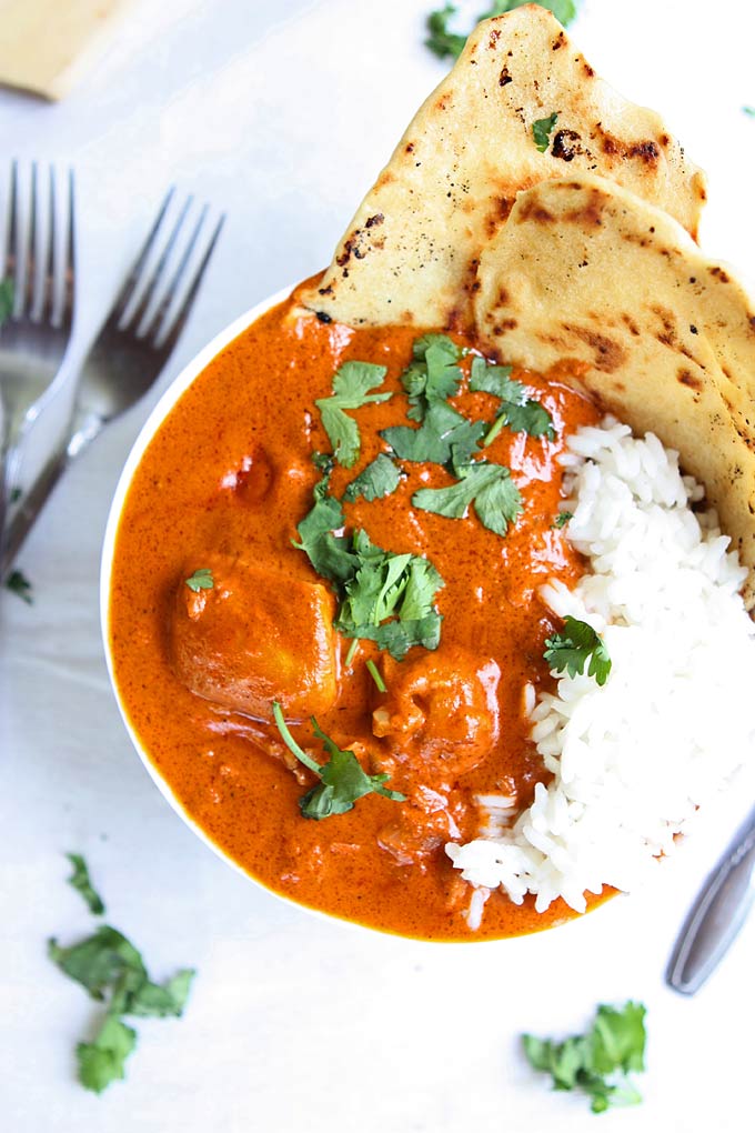 Creamy curry with rice and naan